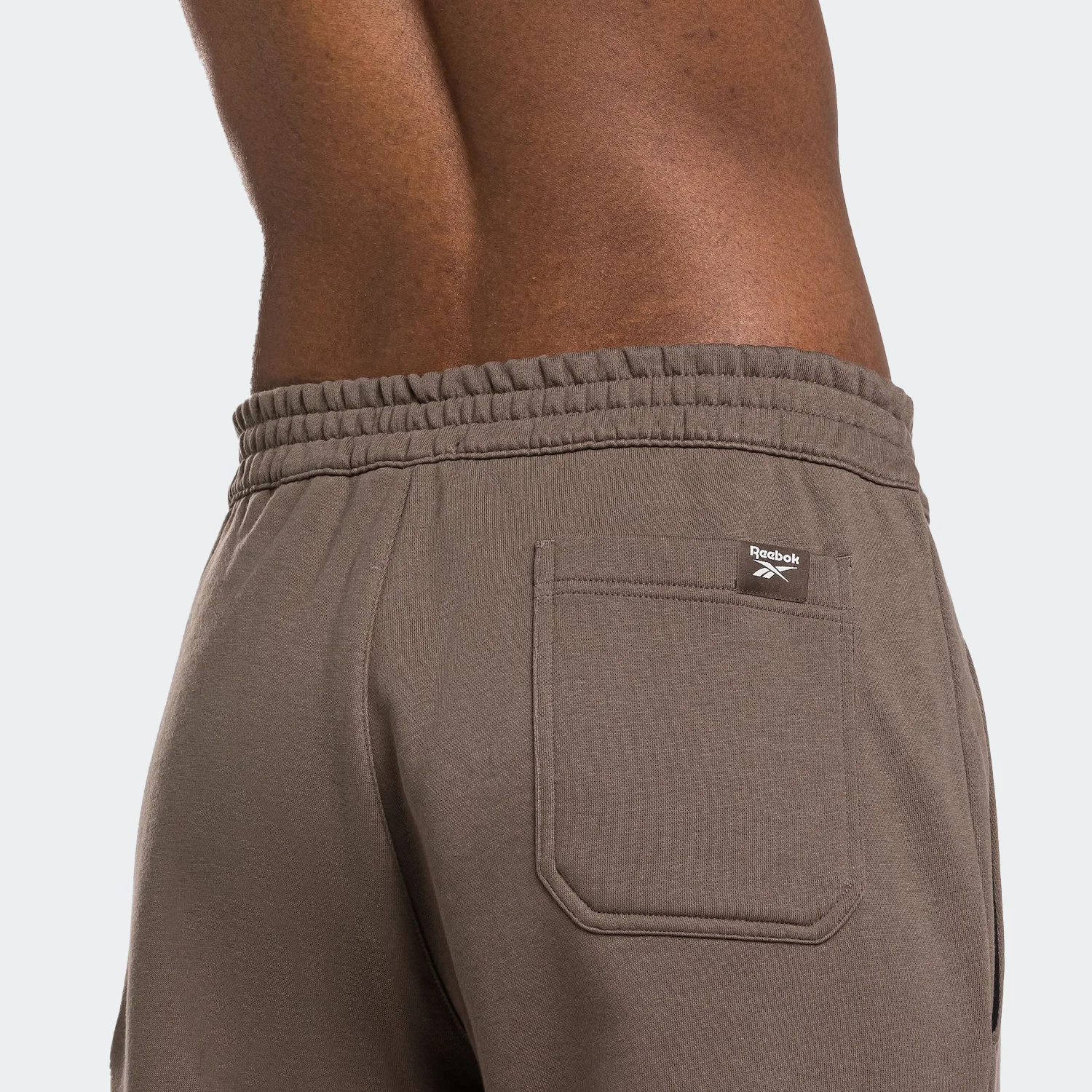 100070974 (5) شلوار مردانه ریباک شلوار مردانه ریباک مدل Classic Wide-leg Fleece Sweatpants - Image 5